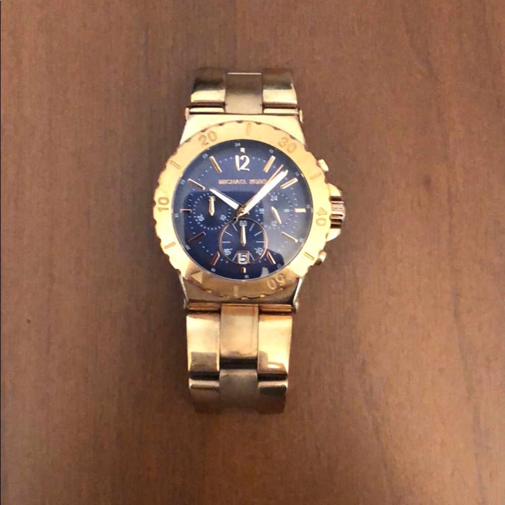 Rose gold Michael Kors watch with navy face
